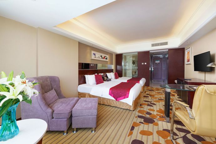 Imagen de la habitación del Hotel Oasis Grand Hotel. Foto 9