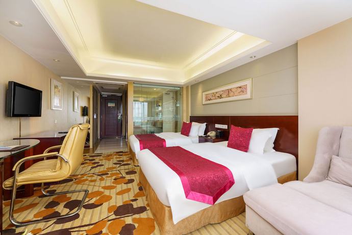 Imagen de la habitación del Hotel Oasis Grand Hotel. Foto 12