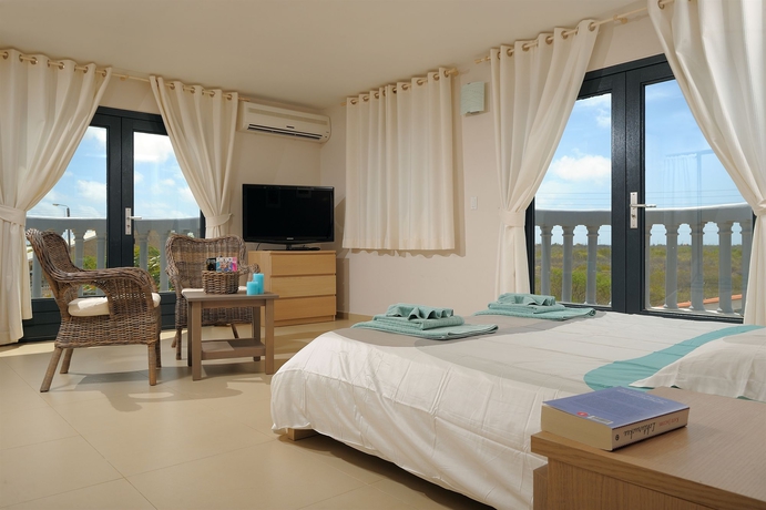 Imagen de la habitación del Hotel Oasis Guesthouse Bonaire Superior Suite. Foto 10