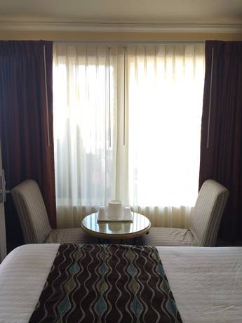 Imagen de la habitación del Hotel Oasis Inn and Suites. Foto 9