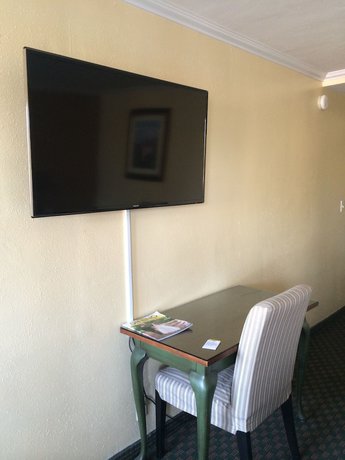 Imagen de la habitación del Hotel Oasis Inn and Suites. Foto 15
