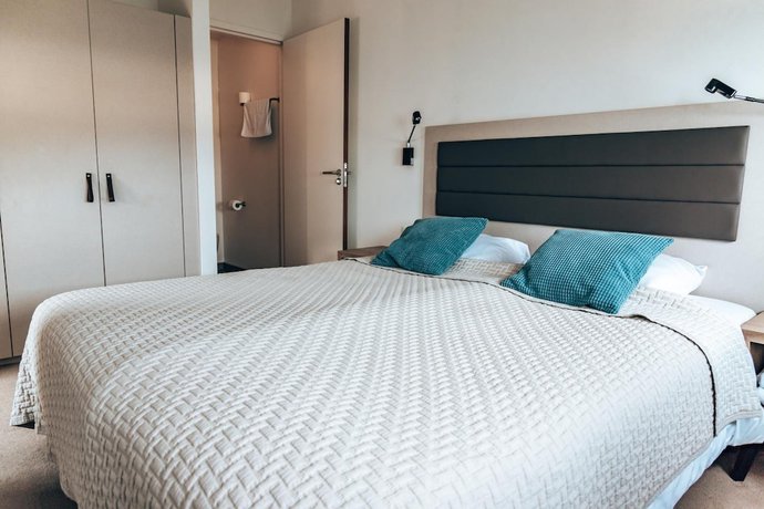 Imagen de la habitación del Hotel Oasis Punt-West and Beach Resort. Foto 7