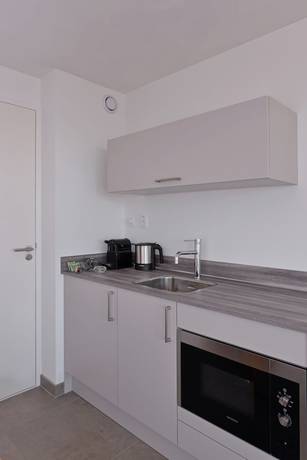 Imagen de la habitación del Hotel Oasis Punt-West and Beach Resort. Foto 8