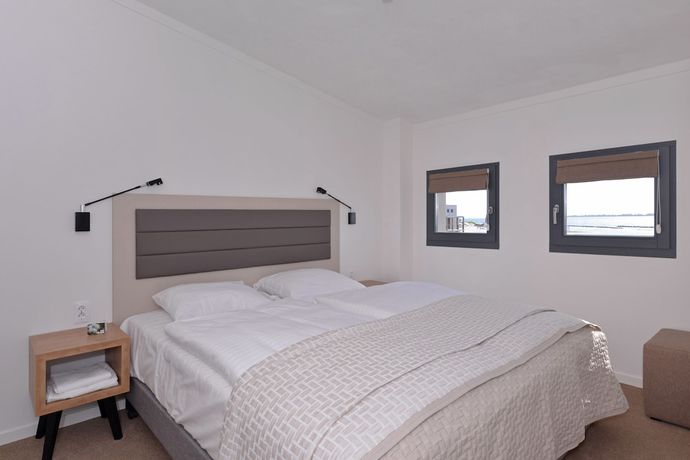 Imagen de la habitación del Hotel Oasis Punt-West and Beach Resort. Foto 13