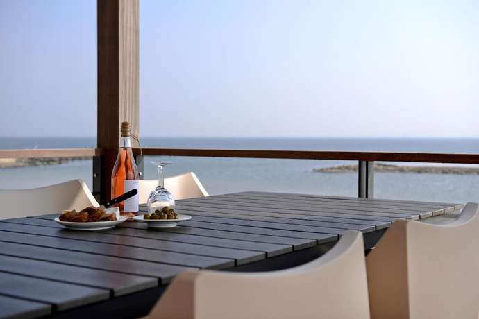 Imagen de la habitación del Hotel Oasis Punt-West and Beach Resort. Foto 15