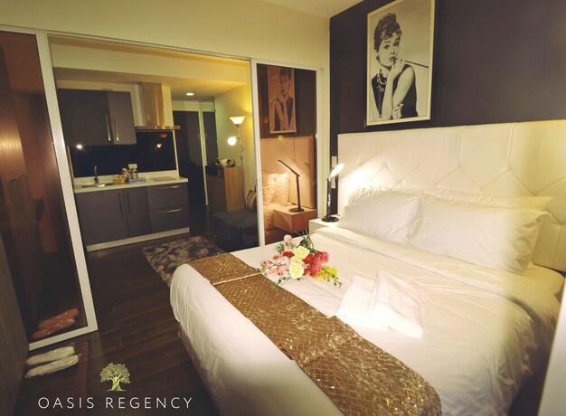 Imagen de la habitación del Hotel Oasis Regency at Acqua Livingstone near Rockwell. Foto 22
