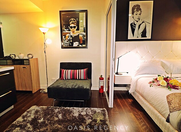 Imagen de la habitación del Hotel Oasis Regency at Acqua Livingstone near Rockwell. Foto 25