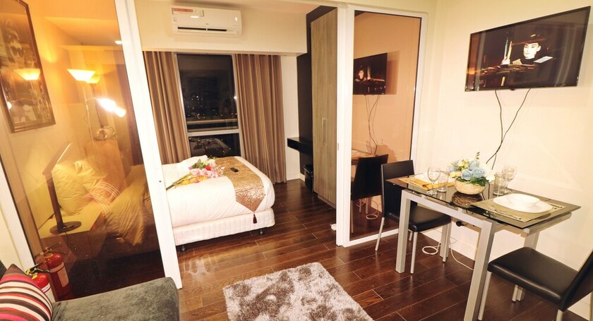 Imagen de la habitación del Hotel Oasis Regency at Acqua Livingstone near Rockwell. Foto 28