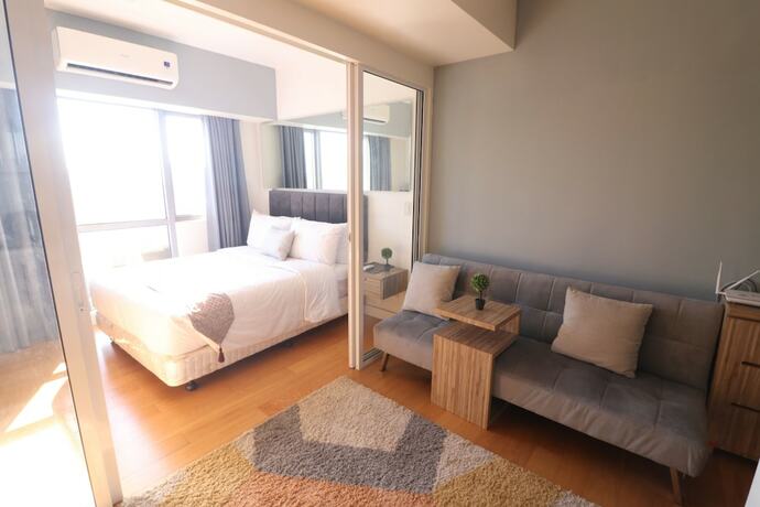 Imagen de la habitación del Hotel Oasis Regency at Acqua Livingstone near Rockwell. Foto 33