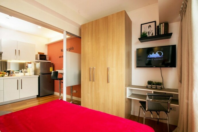 Imagen de la habitación del Hotel Oasis Regency at Acqua Livingstone near Rockwell. Foto 37