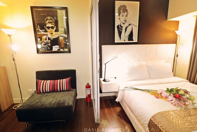 Imagen de la habitación del Hotel Oasis Regency at Acqua Livingstone near Rockwell. Foto 38