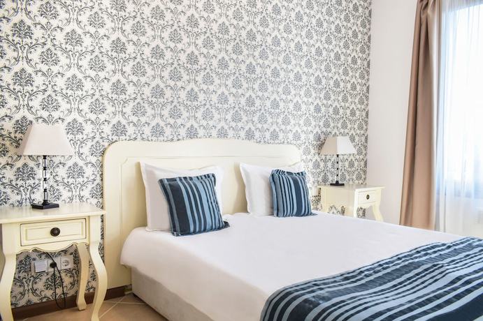 Imagen de la habitación del Hotel Oasis Resort and Spa. Foto 10