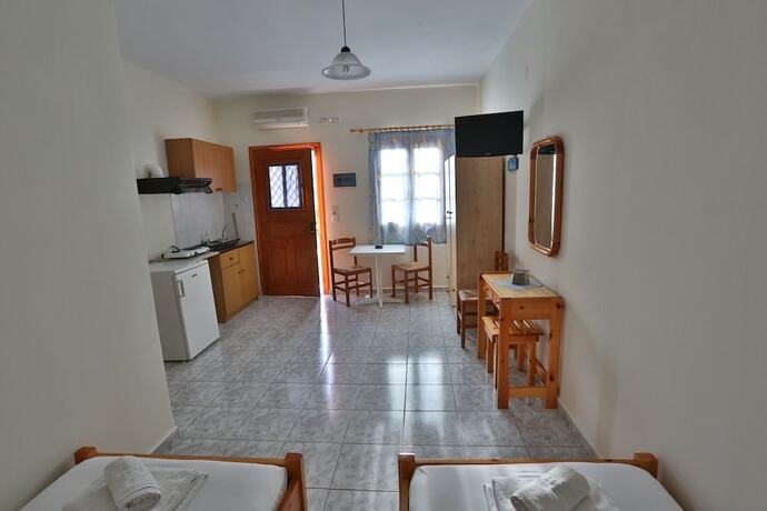 Imagen de la habitación del Hotel Oasis Rooms and Studios. Foto 11