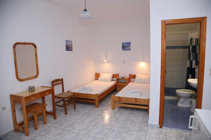 Imagen de la habitación del Hotel Oasis Rooms and Studios. Foto 12