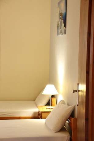 Imagen de la habitación del Hotel Oasis Rooms and Studios. Foto 14