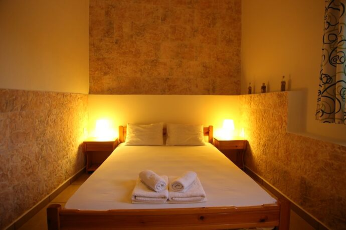 Imagen de la habitación del Hotel Oasis Rooms and Studios. Foto 16