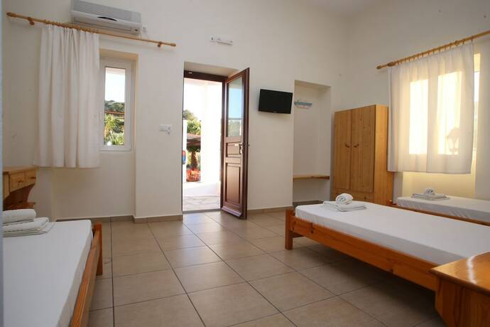 Imagen de la habitación del Hotel Oasis Rooms and Studios. Foto 18