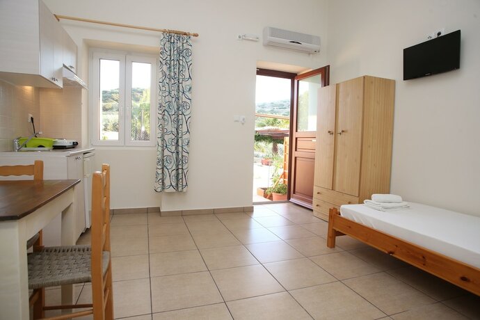 Imagen de la habitación del Hotel Oasis Rooms and Studios. Foto 19