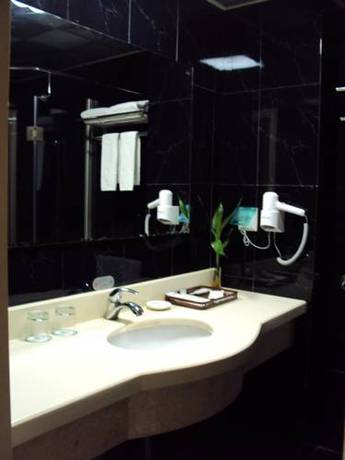 Imagen de la habitación del Hotel Oasis, Ruian. Foto 1