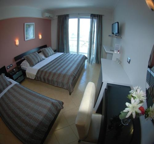 Imagen de la habitación del Hotel Oasis, Sarande. Foto 8