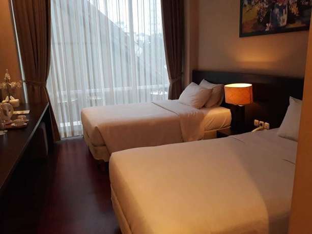 Imagen de la habitación del Hotel Oasis Siliwangi Sport. Foto 6