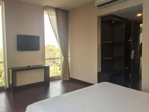 Imagen de la habitación del Hotel Oasis Siliwangi Sport. Foto 11