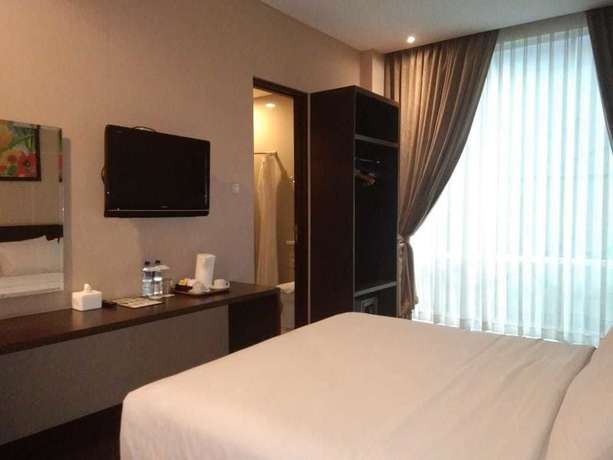 Imagen de la habitación del Hotel Oasis Siliwangi Sport. Foto 13