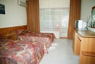 Imagen de la habitación del Hotel Oasis Village. Foto 1