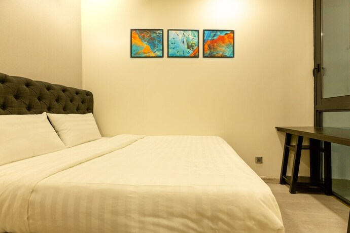 Imagen de la habitación del Hotel Oasis Vinhome Golden River Apt. Foto 13