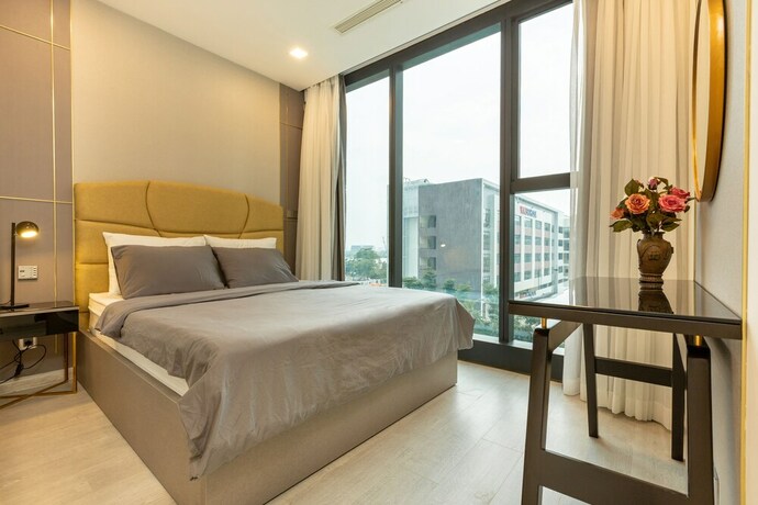 Imagen de la habitación del Hotel Oasis Vinhome Golden River Apt. Foto 17