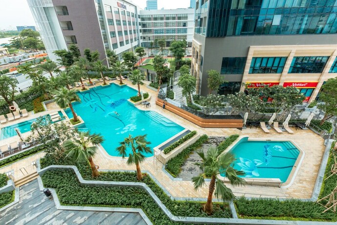 Imagen de los exteriores del Hotel Oasis Vinhome Golden River Apt. Foto 20