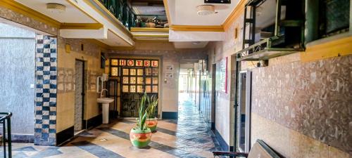 Imagen general del Hotel Oasis and Guest House. Voi. Foto 3