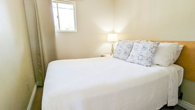 Imagen de la habitación del Hotel Oasis by the Bay Vacation Suites. Foto 15