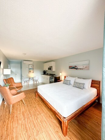 Imagen de la habitación del Hotel Oasis by the Bay Vacation Suites. Foto 16