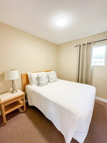 Imagen de la habitación del Hotel Oasis by the Bay Vacation Suites. Foto 18