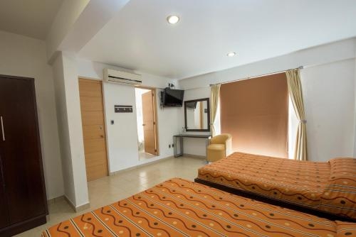 Imagen de la habitación del Hotel Oaxaca Inn Express. Foto 7
