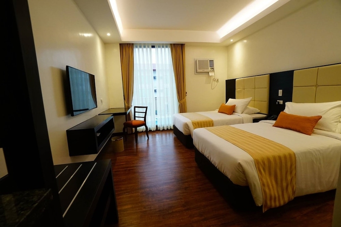 Imagen de la habitación del Hotel Oazis Butuan. Foto 3