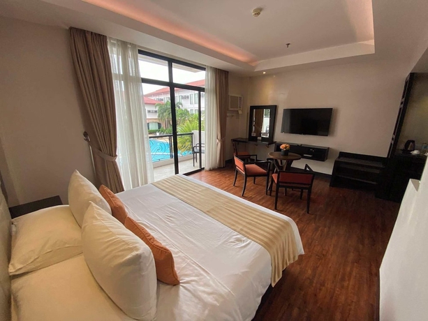 Imagen de la habitación del Hotel Oazis Butuan. Foto 6