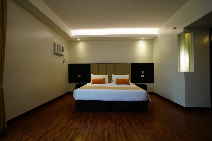 Imagen de la habitación del Hotel Oazis Butuan. Foto 7