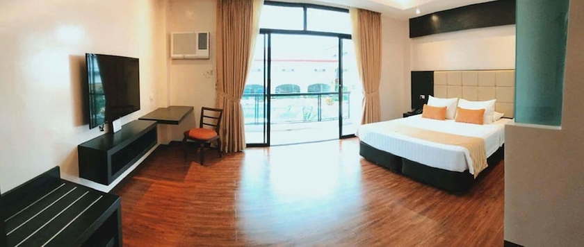 Imagen de la habitación del Hotel Oazis Butuan. Foto 8