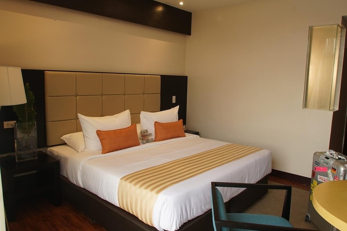 Imagen de la habitación del Hotel Oazis Butuan. Foto 10