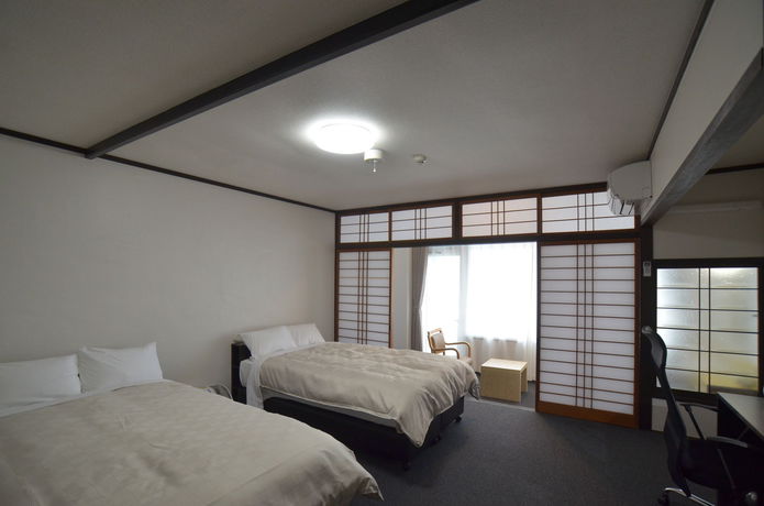 Imagen de la habitación del Hotel Obama-onsen Hamakan. Foto 2