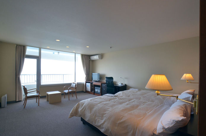 Imagen de la habitación del Hotel Obama-onsen Hamakan. Foto 13