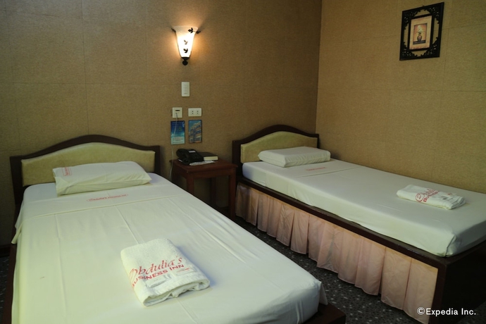 Imagen de la habitación del Hotel Obdulia's Business Inn. Foto 9