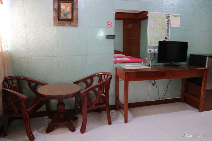 Imagen de la habitación del Hotel Obdulia's Business Inn. Foto 11