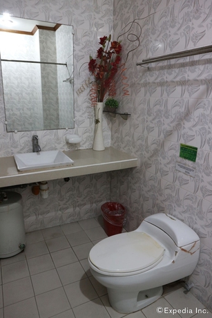 Imagen de la habitación del Hotel Obdulia's Business Inn. Foto 13