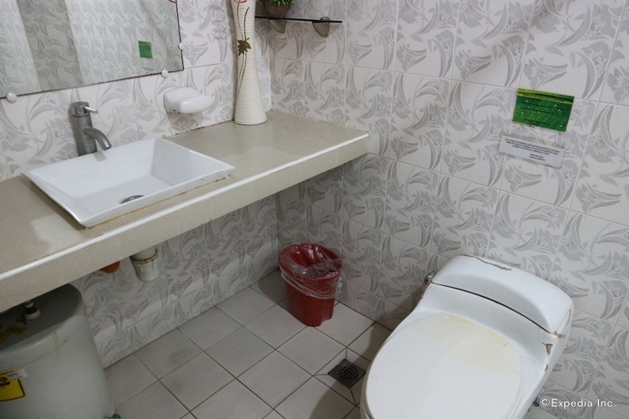 Imagen de la habitación del Hotel Obdulia's Business Inn. Foto 14