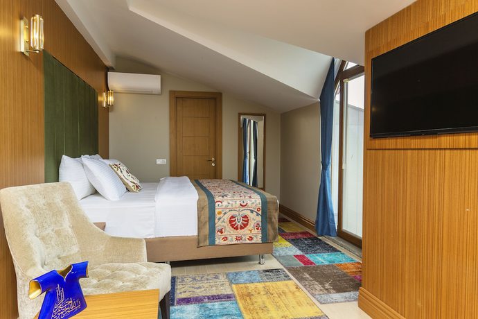 Imagen de la habitación del Hotel Obelisk and Suites. Foto 2