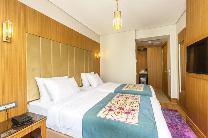 Imagen de la habitación del Hotel Obelisk and Suites. Foto 3