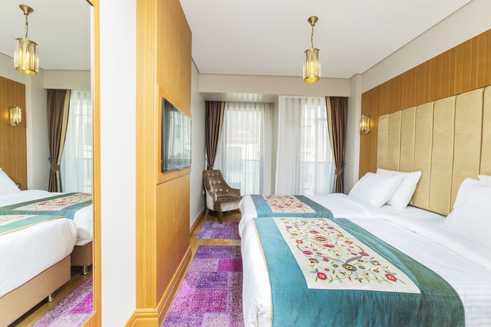 Imagen de la habitación del Hotel Obelisk and Suites. Foto 8